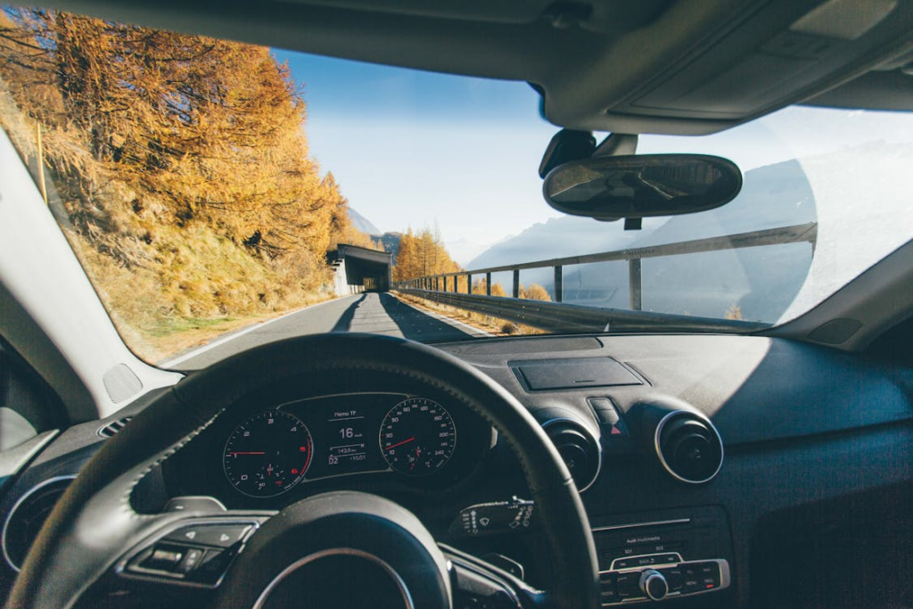 Interior of a rented car while traveling around the road. 